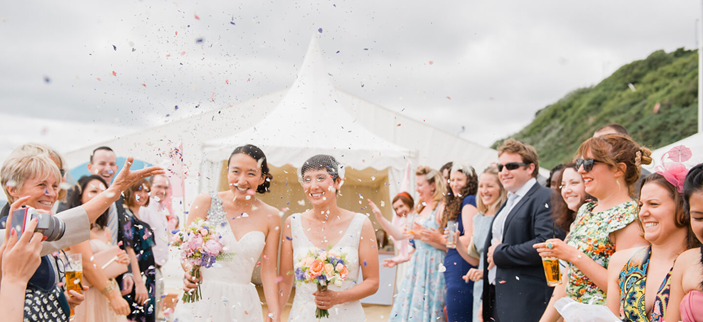 Confetti Covers Lesbian Couple At Beach Weddings Bournemouth Gay Wedding Guide Image Copyright Anna Morgan Photography