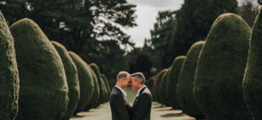 New Gay Couple By Trees At The Elvetham Hotel Wedding Venue Hampshire Gay Wedding Guide Image Rivendell Studio 1 380X174