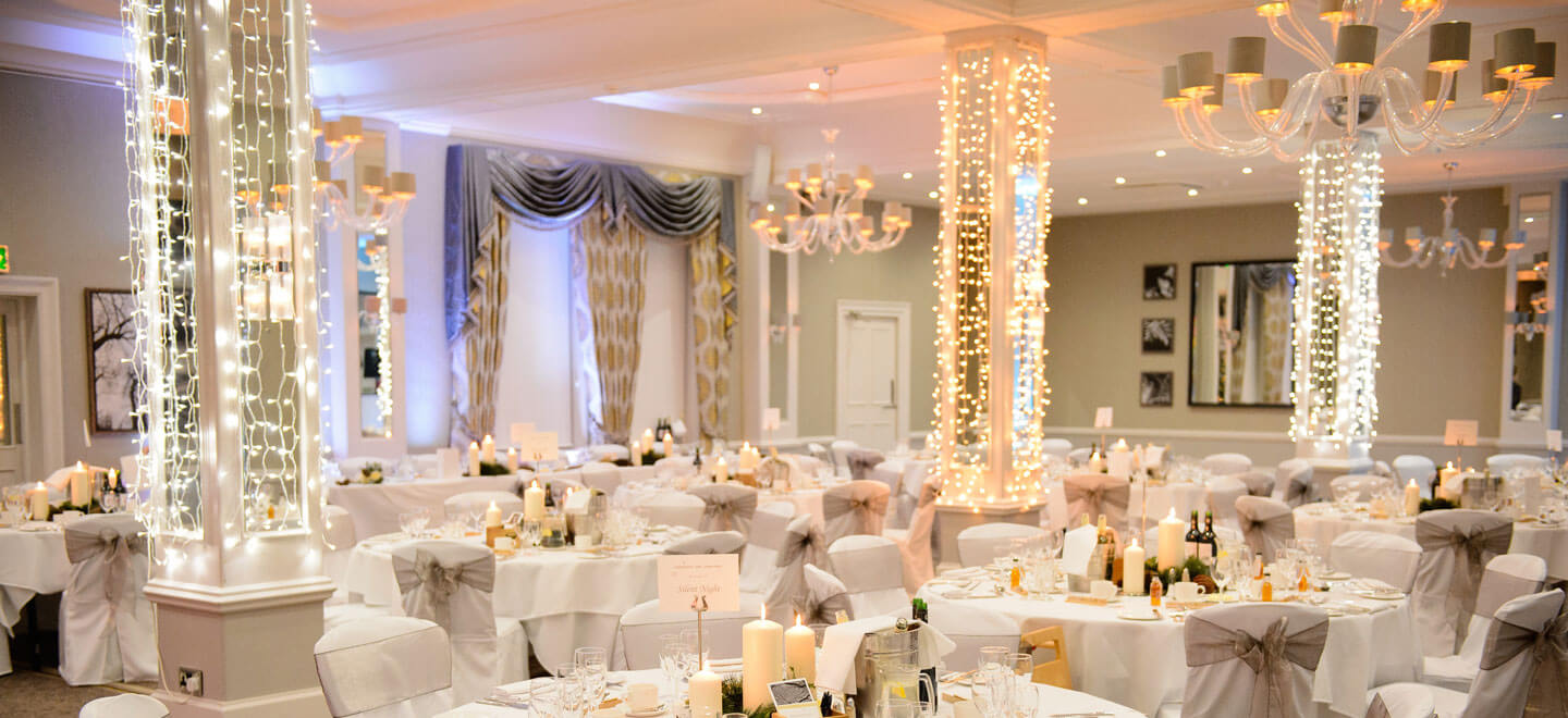Fairylit winter wedding table layout at Richmond Hill Hotel Surrey Wedding Venue Gay Wedding Guide