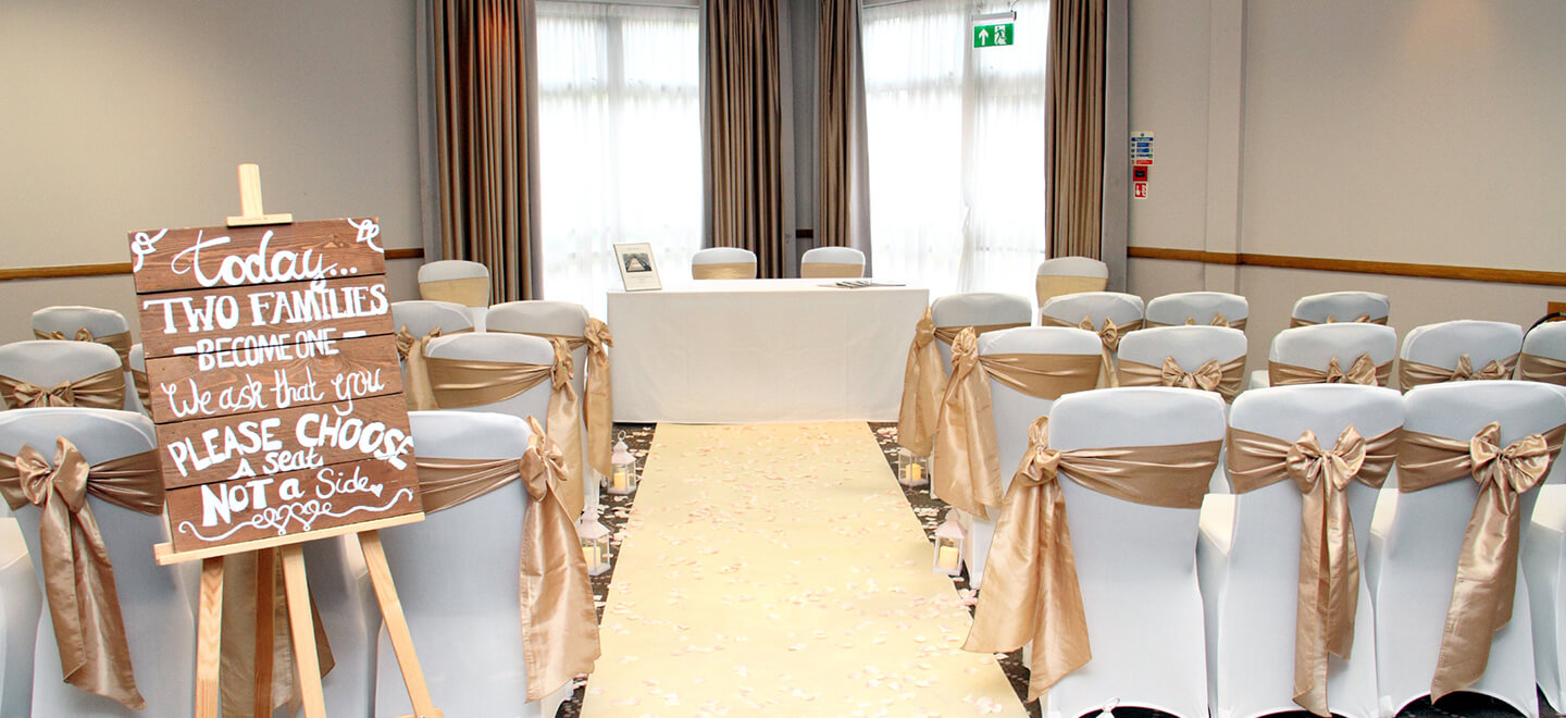 Bromsgrove Hotel wedding ceremony layout with sign gay wedding guide 1