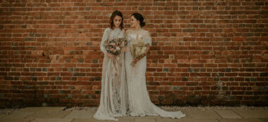 Lesbian Brides Outside Wall At Brickhouse Vineyard Unique Wedding Venue Devon Via The Gay Wedding Guide 380X174