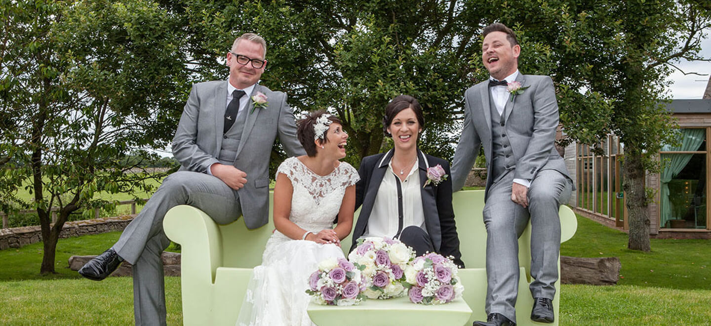 10 lesbian brides sit with gay grooms at lesbian wedding image by Newcastle wedding photographer Erica Tanith Photography via Gay Wedding Guide 6