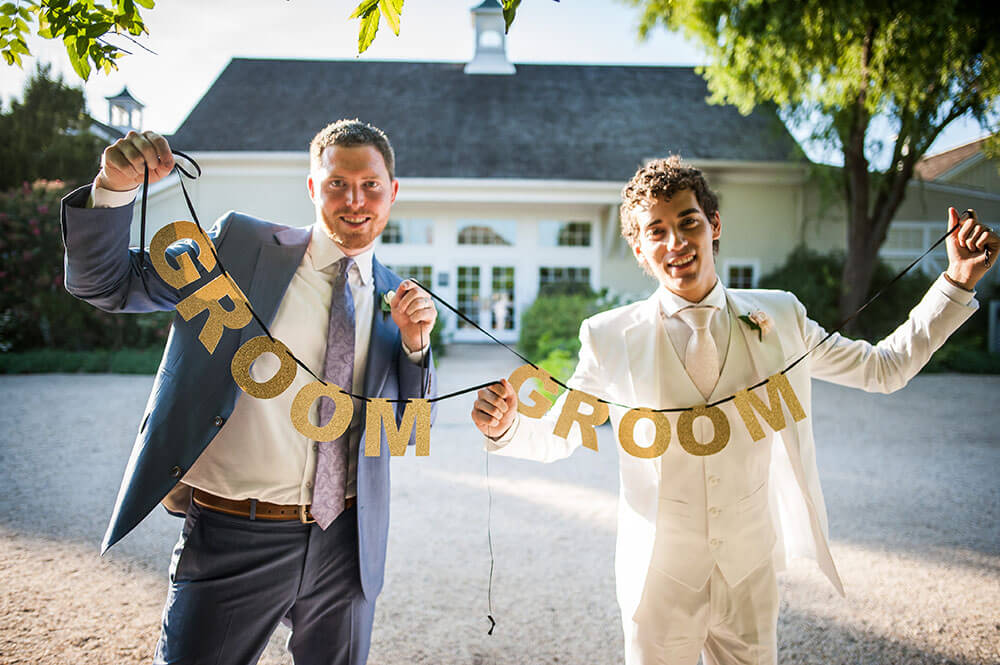 11 two grooms sign at Alex and Havens gay wedding Long Island Gay Wedding Guide image by Caroline Rochetta 1 5
