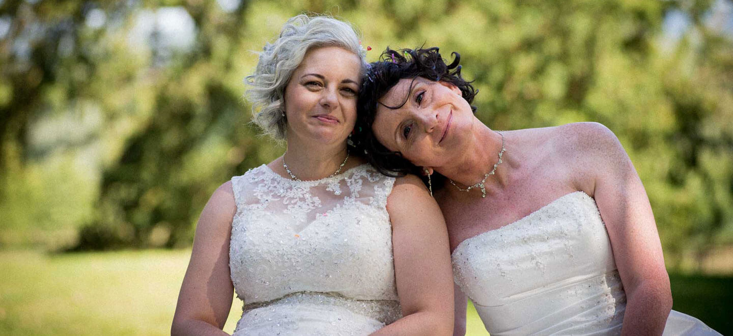 1440 Denise Kristiana smiling at their lesbian wedding image by zac photography 2