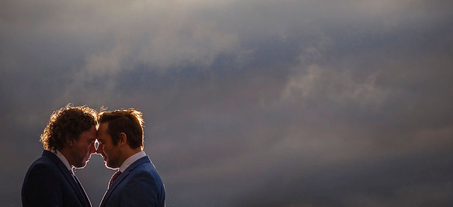 1440 cloudy backdrop Real Gay Wedding of Shaun and Carl via The Gay Wedding Guide images by Ross Willsher