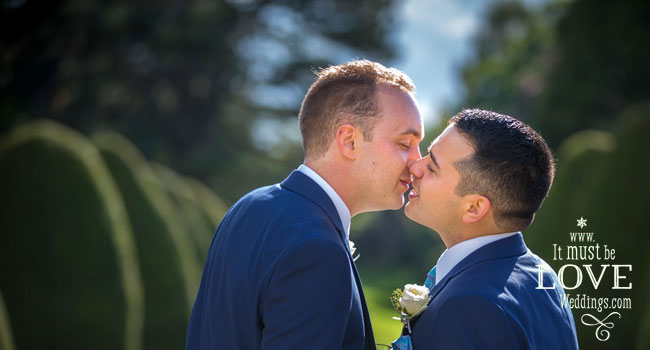 16 Kissing at Neil and Rumens wedding image by It Must Be Love Weddings Photographer Hampshire via Real Gay Wedding on the Gay Wedding Guide 3 5