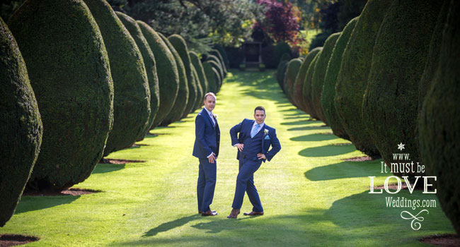 17 The Grooms in the garden at Neil and Rumens wedding image by It Must Be Love Weddings Photographer Hampshire via Real Gay Wedding on the Gay Wedding Guide 3 5