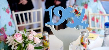 1954 Wooden Table Name Emily Jodie Lesbian Wedding Devon At Ocean Kave Copyright Michael Wells Via The Gay Wedding Guide 3 5 380X174