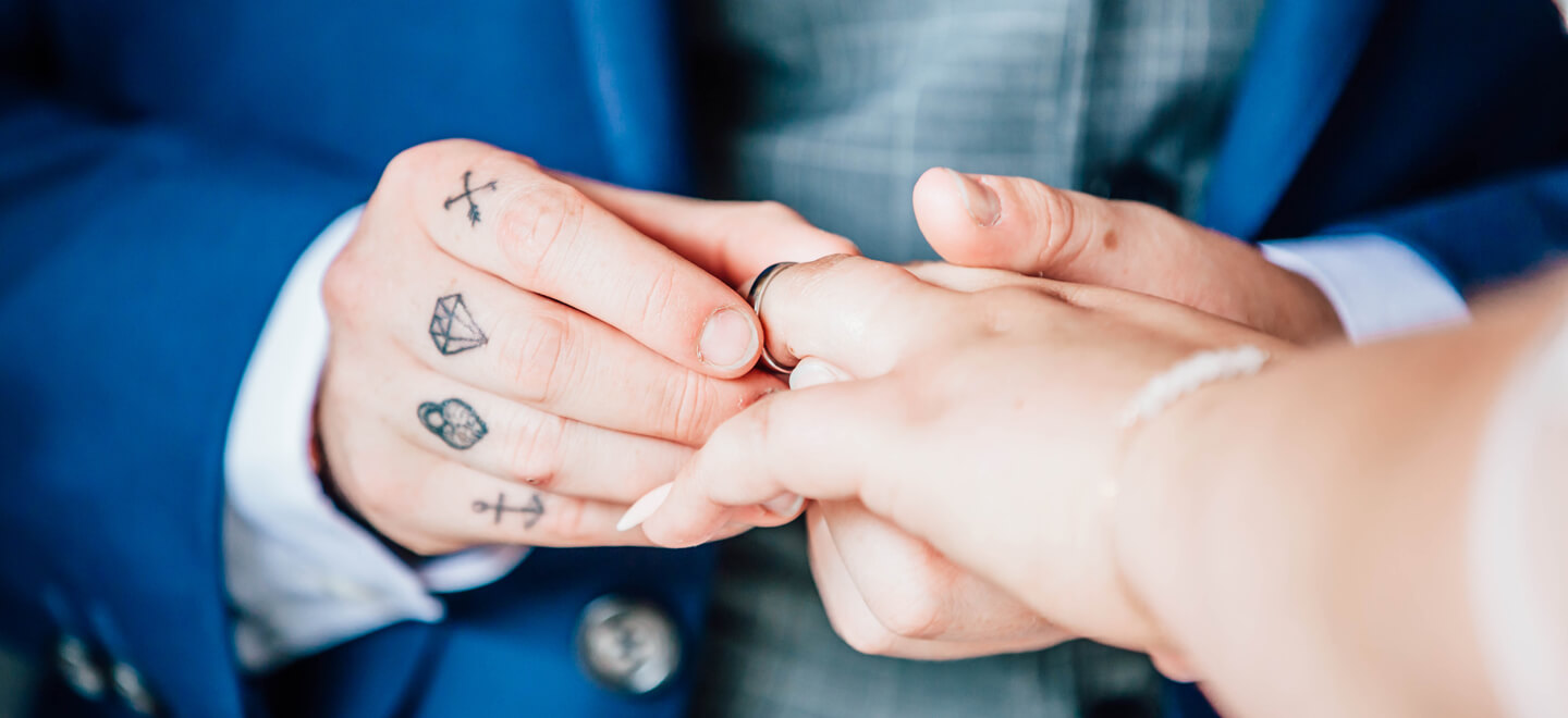 7 putting on rings at lesbian wedding image by Erica Tanith Photography via Gay Wedding Guide 6