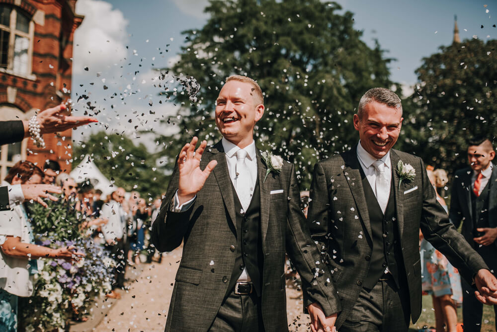 Aaron and Keith confetti shower at their gay wedding Hampshire at The Elvetham photographer DM Photography 1 5