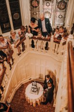 Aaron And Keith Cut Cake At Their Gay Wedding Hampshire At The Elvetham Photographer Dm Photography 1 5 153X230