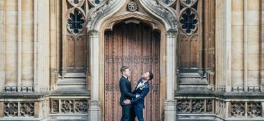 Aaron And Phil By Door At Their Gay Wedding At The Bodelian Oxford Images Copyright Stu Heppell Via The Gay Wedding Guide 3 5 380X174