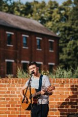 Acoustic Singer At Lee And Simon Gay Wedding At Bombay Sapphire Distillery Gay Wedding Guide Image By This And That Photography 1 5 153X230