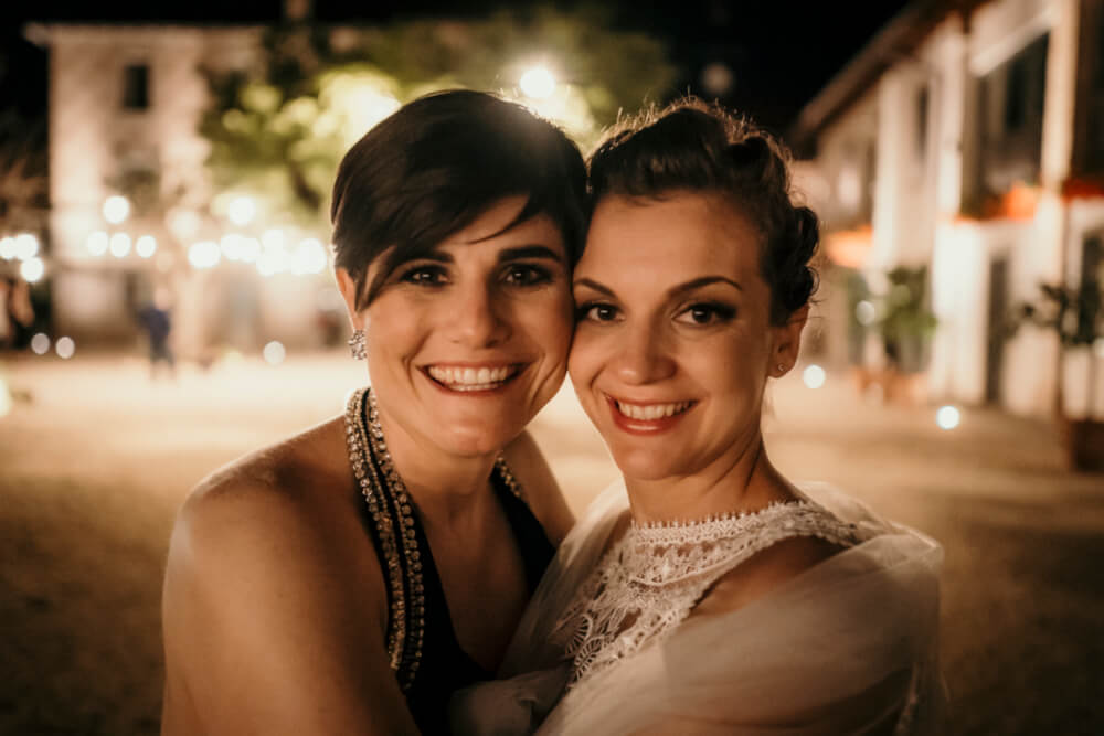 Agnese and Gaia embrace at their lesbian wedding photography Frank Cattuci Photo via Gay Wedding Guide 1 5