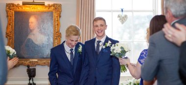 Alan And James Walk Down Aisle At Their Gay Wedding Black And White Photo Copyright Mirror Imaging Photography Via The Gay Wedding Guide 3 5 380X174