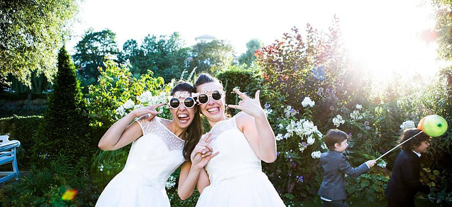 Ale and Eva real lesbian wedding sunglasses image copyright Paola De Paola Photography via The Gay Wedding Guide 3 5