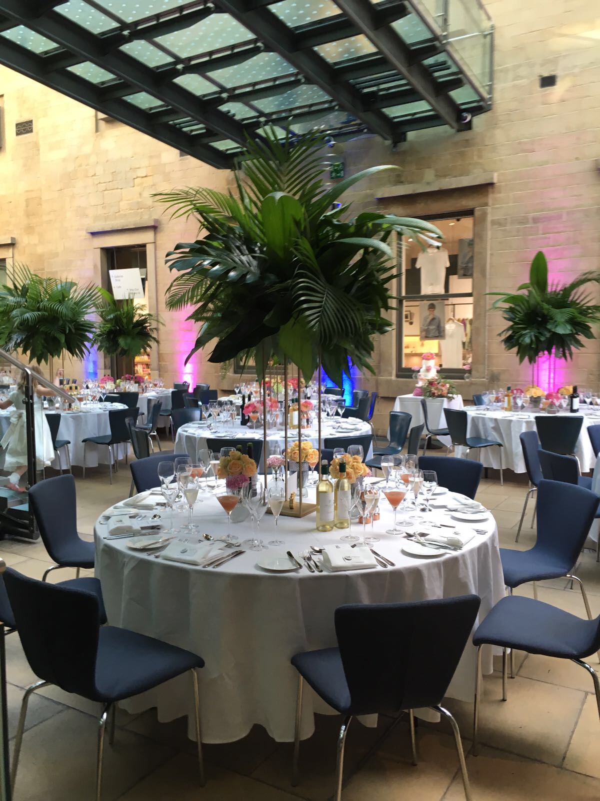 Atrium wedding dining palms