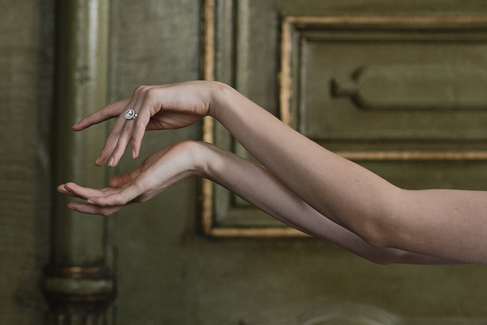 Ballerina elegantly shapes hands at Swan Lake wedding shoot styled via Gay Wedding Guide 8