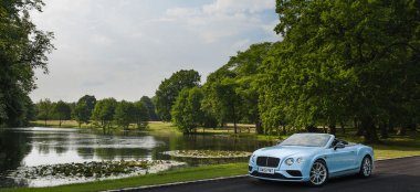 Bentley Driving Past The Lake At Dorfold Hall Nantwich Gay Wedding Venue Cheshire Via The Gay Wedding Guide 9 380X174