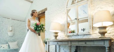 Bride In Preparation Room At Stratton Court Barn Wedding Venue Oxford Gay Wedding Guide 9 380X174