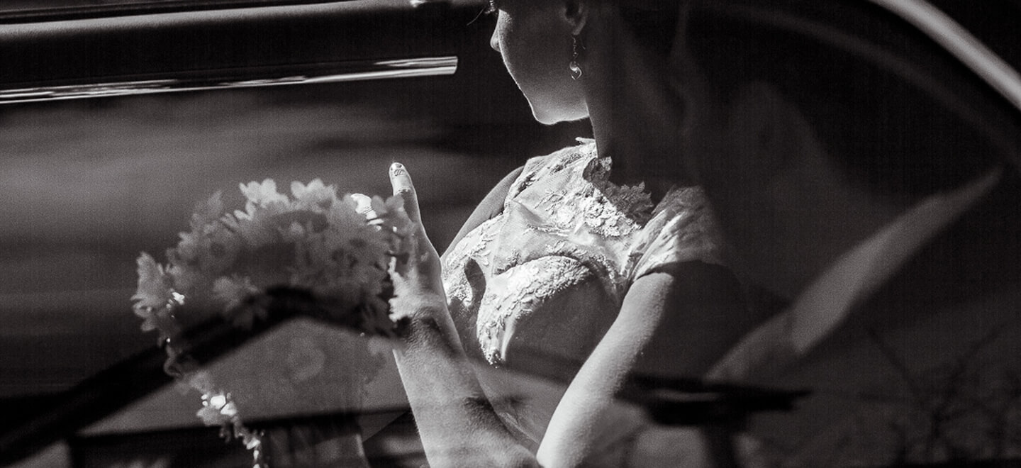 Bride in wedding car by gay and lesbian wedding photograhper Andrew Duncan Photography via Gay Wedding Guide 6