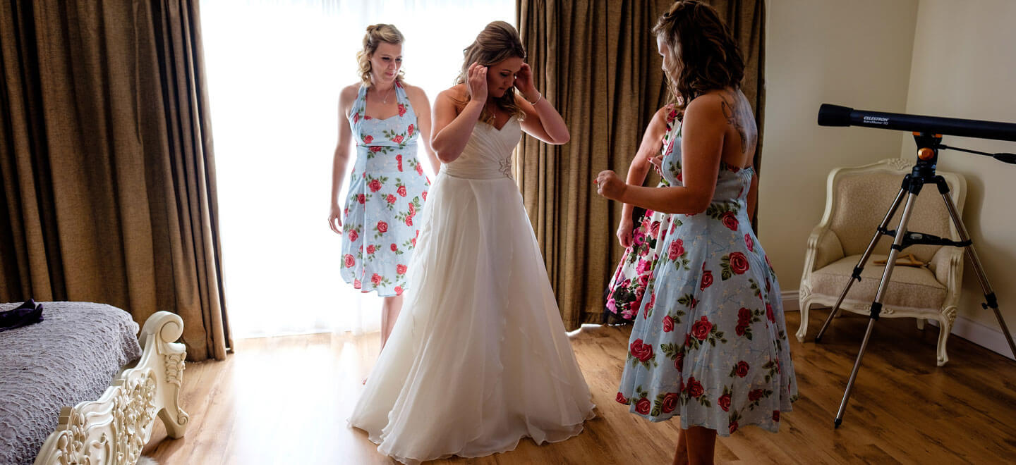 Bride with Bridesmaids at Emily Jodie lesbian wedding Devon at Ocean Kave copyright Michael Wells via the Gay Wedding Guide 3 5