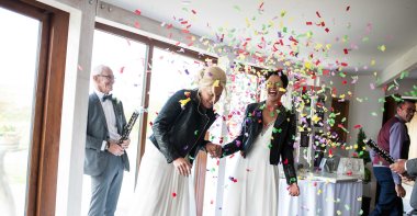 Brides Confetti At Lesbian Wedding Of Emma And Amy At Ocean Kave Image By Mrsjutsonphotography 1 5 380X197