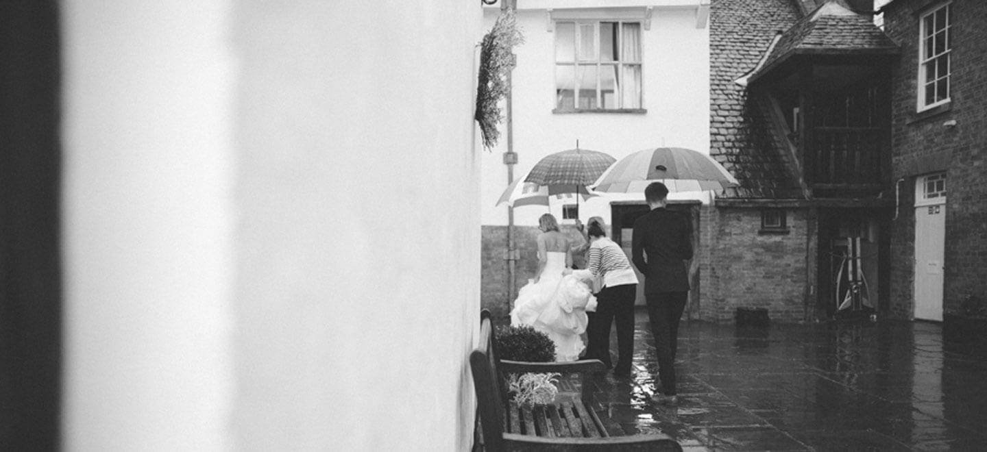 Catherine and Jen lesbian wedding photographer umbrellas Ragdoll Photography via the Gay Wedding Guide 3 5