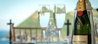 Champagne With Two Glasses At Sandy Beach Hotel Beach Wedding Venue Devon Gay Wedding Guide 9 380X174
