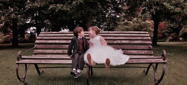 Children On A Bench At Wedding Image By Tony Hall Gay Wedding Photographer Yorkshire 6 380X174