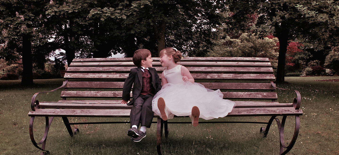 Children on a Bench at Wedding Image by Tony Hall Gay Wedding Photographer Yorkshire 6