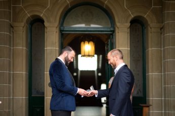 Chris And Ben Exchange Rings At Their Gay Wedding Gatsby Themed Gay Wedding Guide 3 5 345X230