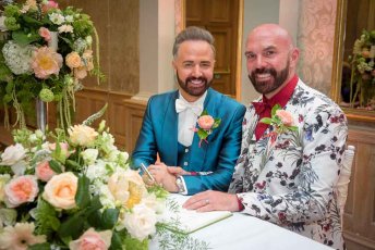 Chris And Tony Sign The Register At Their Real Gay Wedding At The Grand Via The Gay Wedding Guide 1 5 344X230