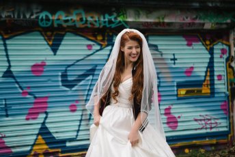 Claudia Near Graffitti Garage For Her Lesbian Wedding Shoot Image Copyright Rachel Movitz Weddings Via The Gay Wedding Guide 1 5 344X230