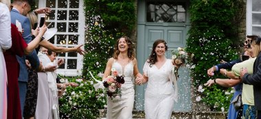 Confetti Shower Over Lesbian Brides At Kingston Estate Country House Wedding Venue Devon Gay Wedding Guide 9 380X174