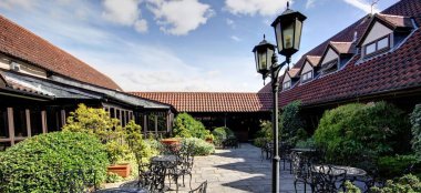 Cosy Courtyard At The Chicester Hotel Barn Wedding Venue Essex Gay Wedding Guide 9 380X174