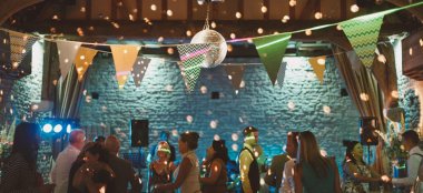 Dancing And Glitterball Disco At Tythe Barn Wedding Venue Oxfordshire Via The Gay Wedding Guide 9 380X174