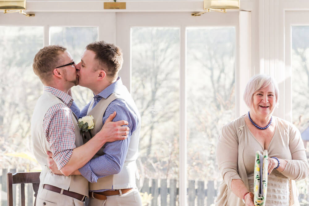 Danny and Andy kiss at their real gay wedding image copyright DK Ashton Photography via Gay Wedding Guide 2 5