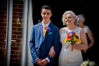 Denise Kristiana Approach Aisle 1 At Their Real Lesbian Wedding Image Copyright Zac Photography Via Gay Wedding Guide 1 5 344X230