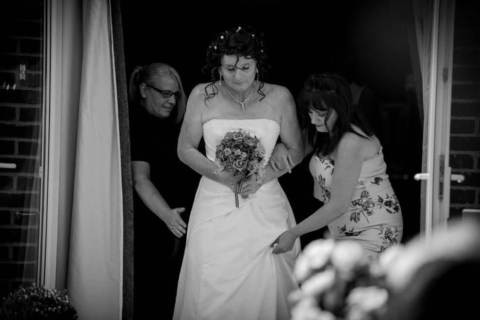 Denise Kristiana approach aisle at their real lesbian wedding image copyright Zac Photography via gay wedding guide 1 5