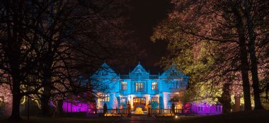 Dorfold Hall At Night Lit With Pink And Blue Uplighters Nantwich Gay Wedding Venue Cheshire Via The Gay Wedding Guide 9 380X174