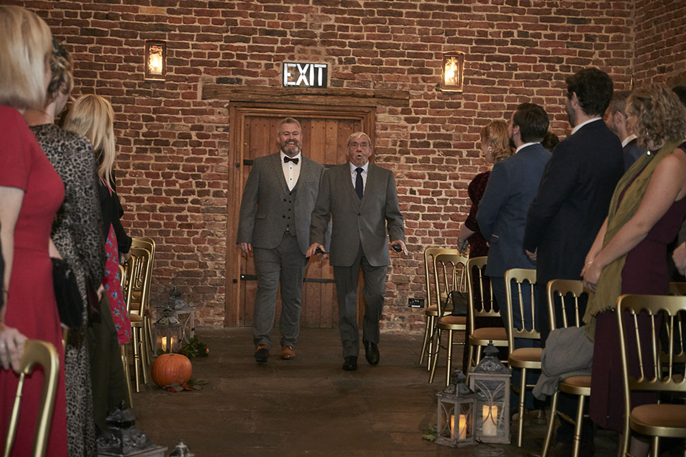 Down the aisle at gay wedding of Rory and Colin image by Hoult Photography via Gay Wedding Guide 1 5