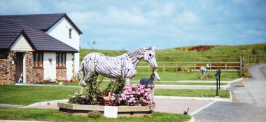 Driftwood Horses At Lesbian Wedding Of Emma And Amy At Ocean Kave Image By Margorphotography1 6651 1 1 5 380X174