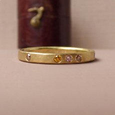 Dusk Ethical Wedding Ring Made With 18Ct Fairtrade Gold And Pink Chocolate And Mandarin Coloured Diamonds  230X230