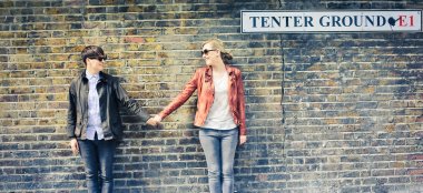 Engagement Shoot By Wall And London Sign Lesbian Wedding Photography Daria Nova Photography Via Gay Wedding Guide 6 380X174