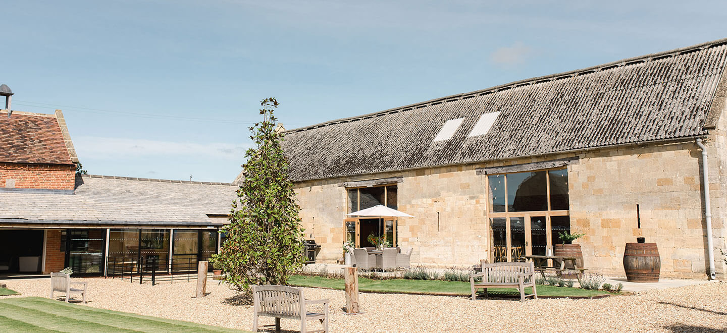 External view of barn at Norton Grounds barn wedding venue Glouchestershire gay wedding guide 9