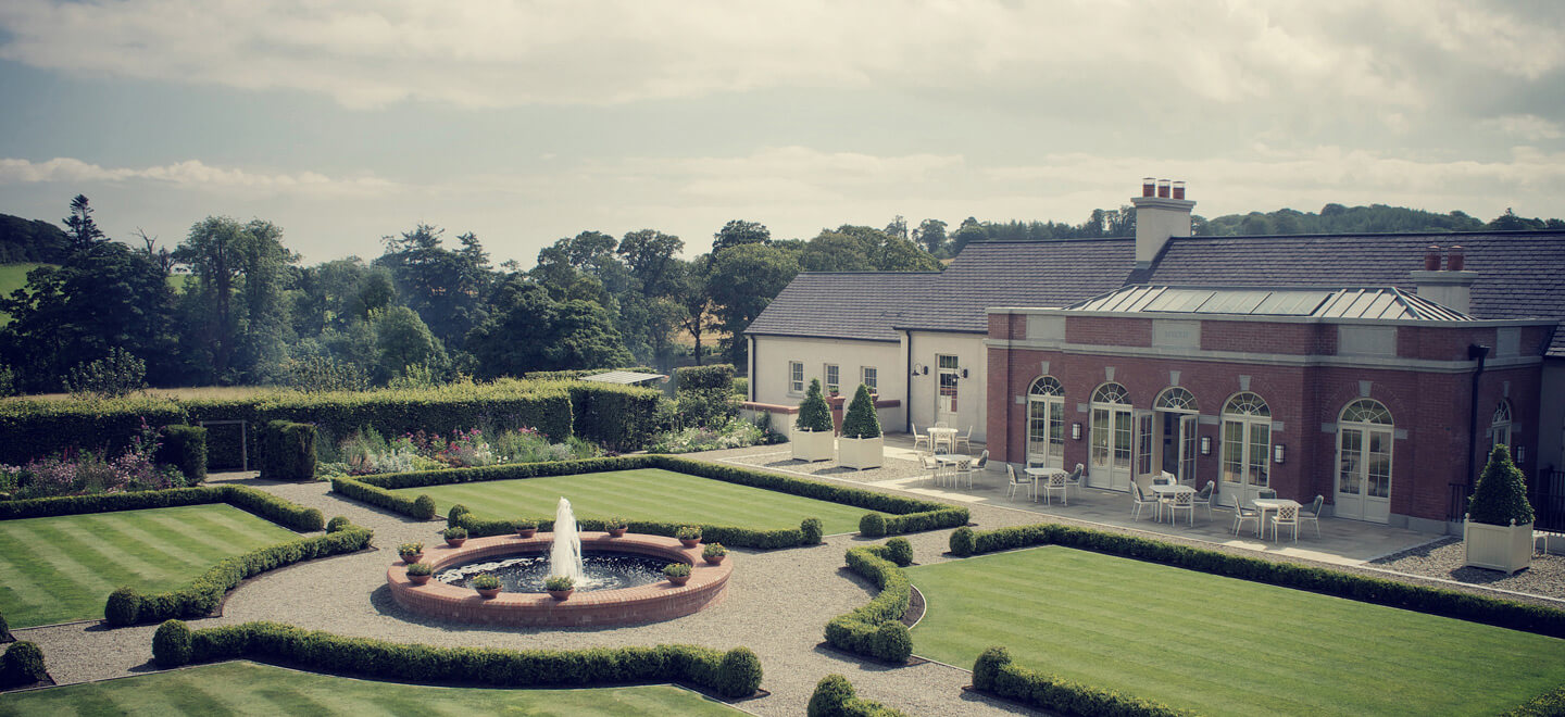 Facade and lawns at wedding venue ballynahinch the Carriage Rooms a barn wedding co down 9
