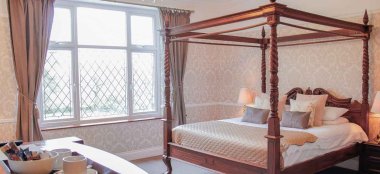 Four Poster Bed At Llechwen Hall Hotel And Garden A Country House Wedding Venue Glamorgan Gay Wedding Guide 9 380X174
