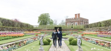 Gay Grooms Walk Through Pond Garden At Hampton Court Palace Unique Royal Wedding Venue Surrey Gay Palace Wedding Guide 9 380X174