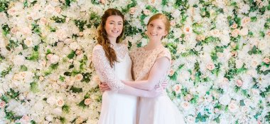 Girls By Flower Wall At Cotswold Wedding Venue Cotswold House Hotel Gloucestershire Gay Wedding Guide 9 380X174